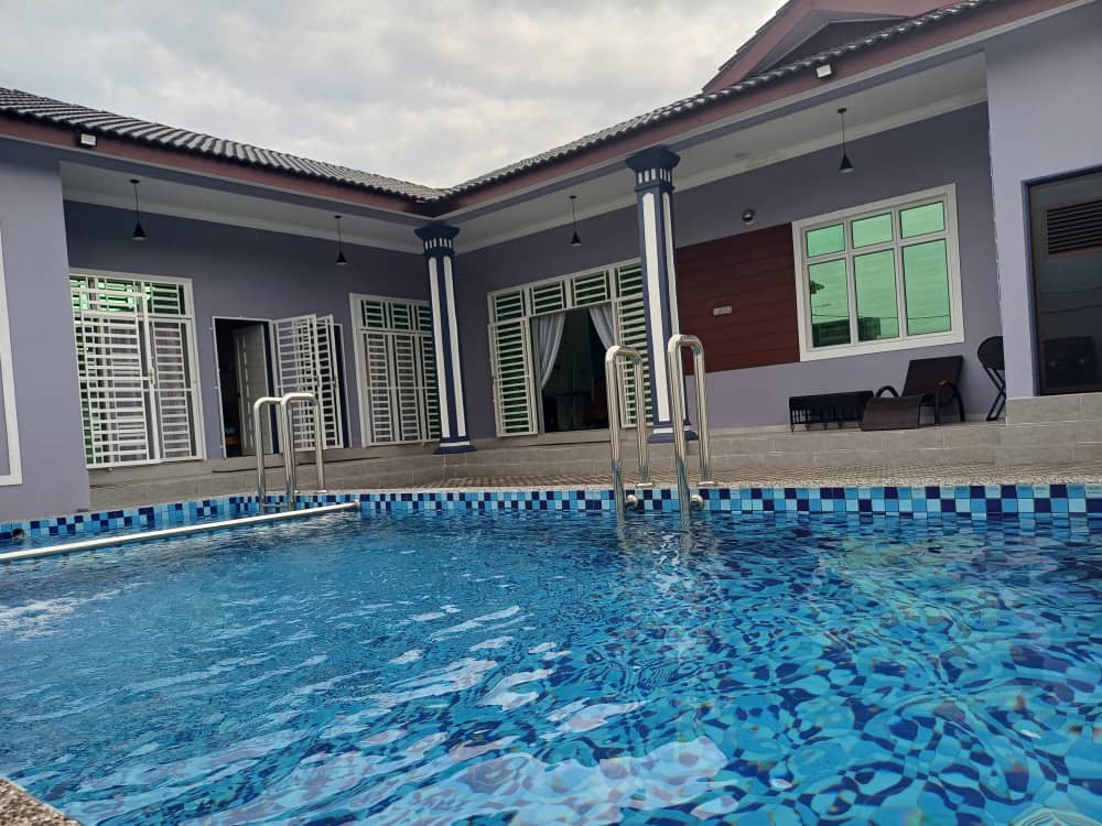 Teratak Zyan Tanah Merah